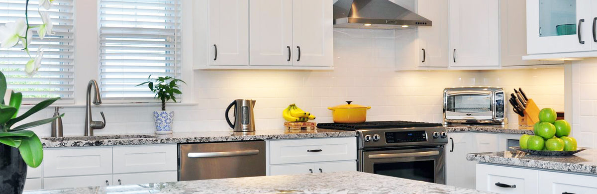 Kitchen scene featuring Ice White Shaker cabinets