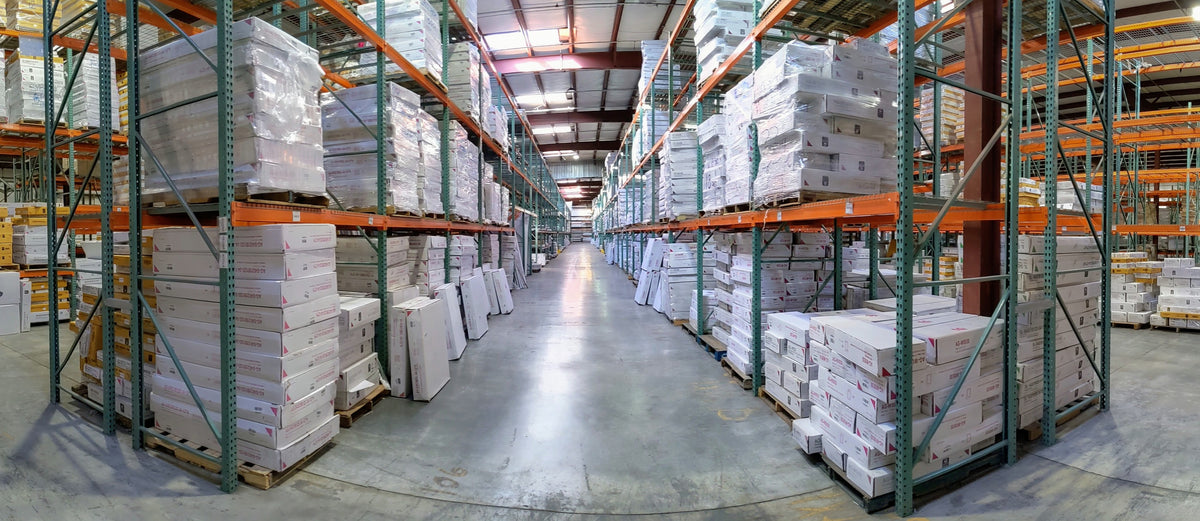 Cabinet Giant warehouse aisle with boxed cabinetry on storage racks